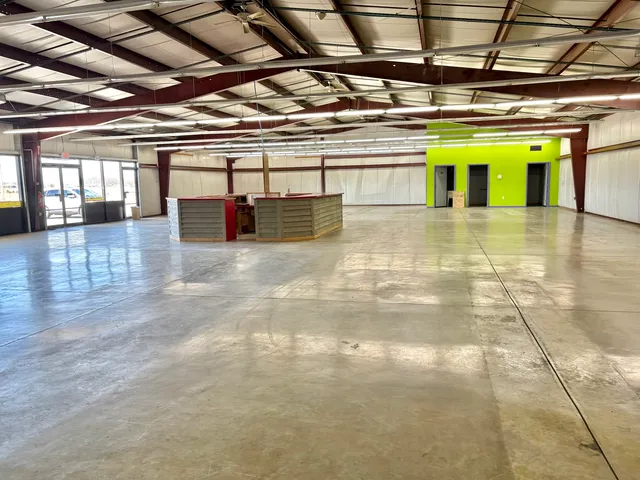 a view of a room with stainless steel appliances