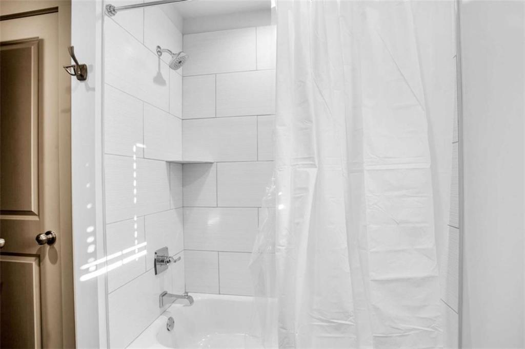 128 Nathan Road Southwest Atlanta, GA 30331 - Photo 21 of 36 a bathroom with a shower