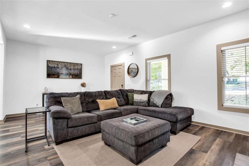 128 Nathan Road Southwest Atlanta, GA 30331 - Photo 5 of 36 a living room with furniture and a window