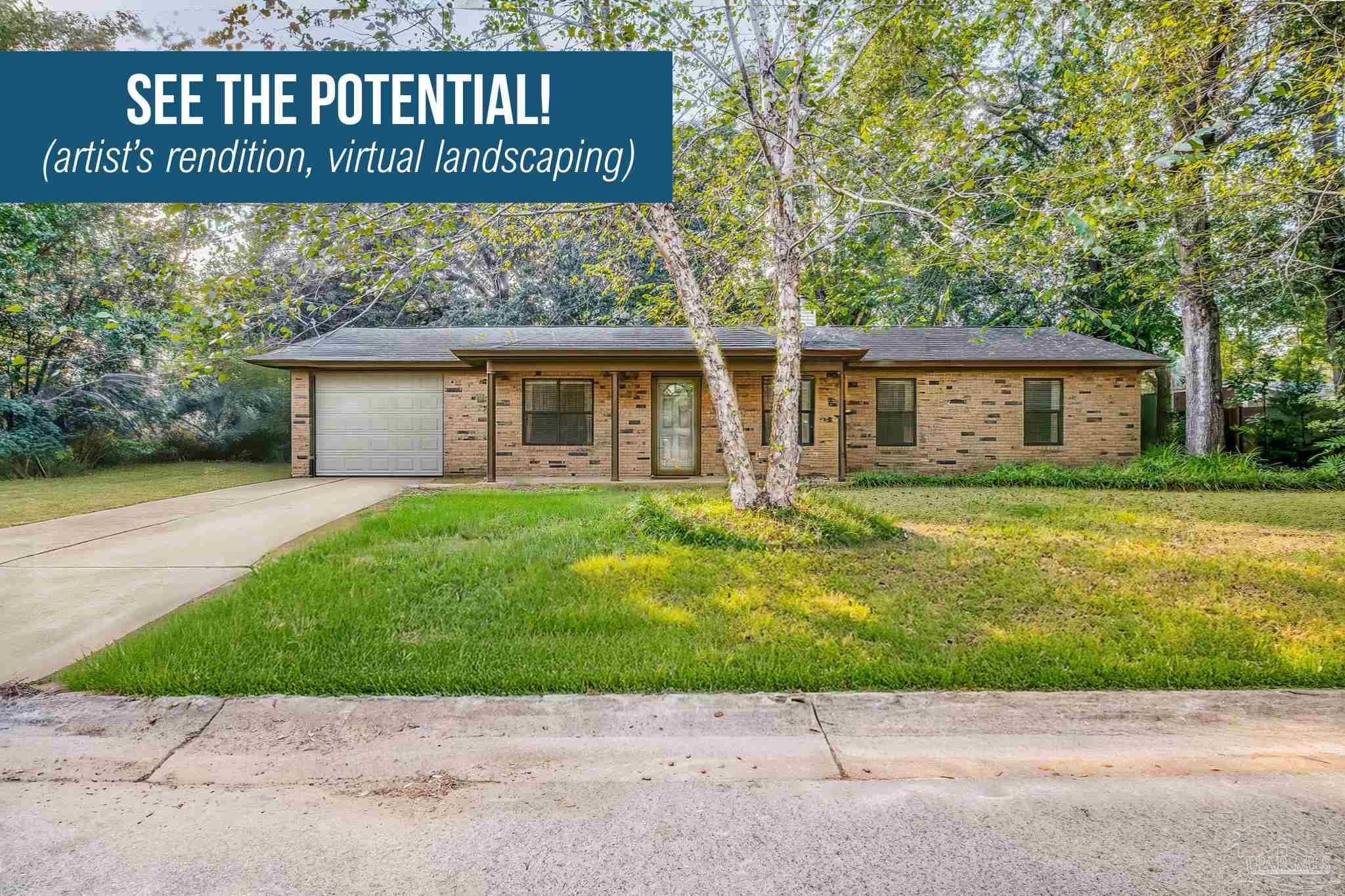 a view of a house with a yard and a garden