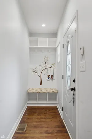 a view of a bathroom with a tub and shower