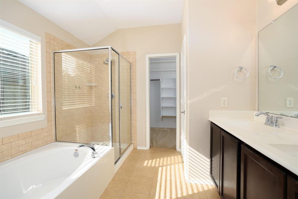 1109 Kaufman Road Melissa, TX 75454 - Photo 12 of 22 a spacious bathroom with a tub shower and sink