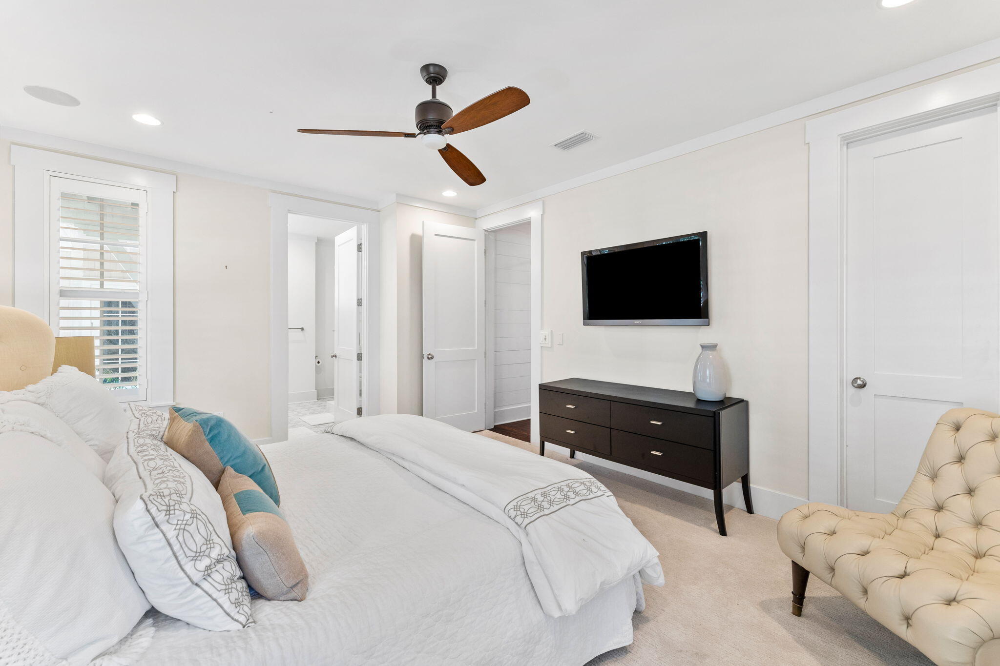 38 Shingle Lane Inlet Beach, FL 32461 - Photo 20 of 94 a bedroom with a bed and a flat tv screen on dresser