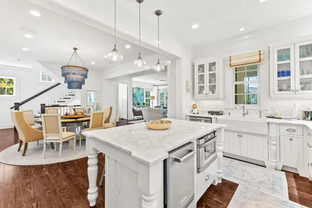 a living room with fireplace furniture and a flat screen tv
