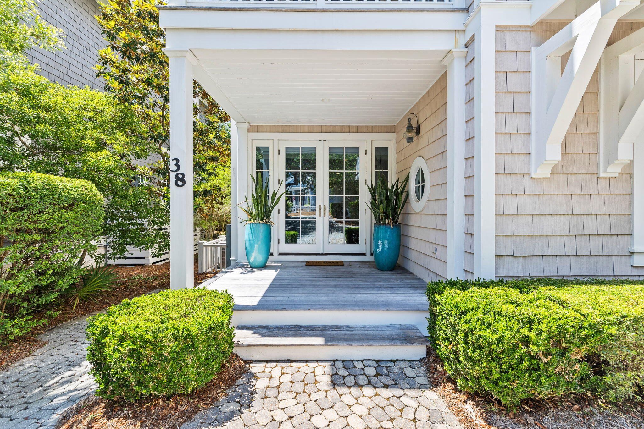 38 Shingle Lane Inlet Beach, FL 32461 - Photo 58 of 94 a front view of a house with a garden