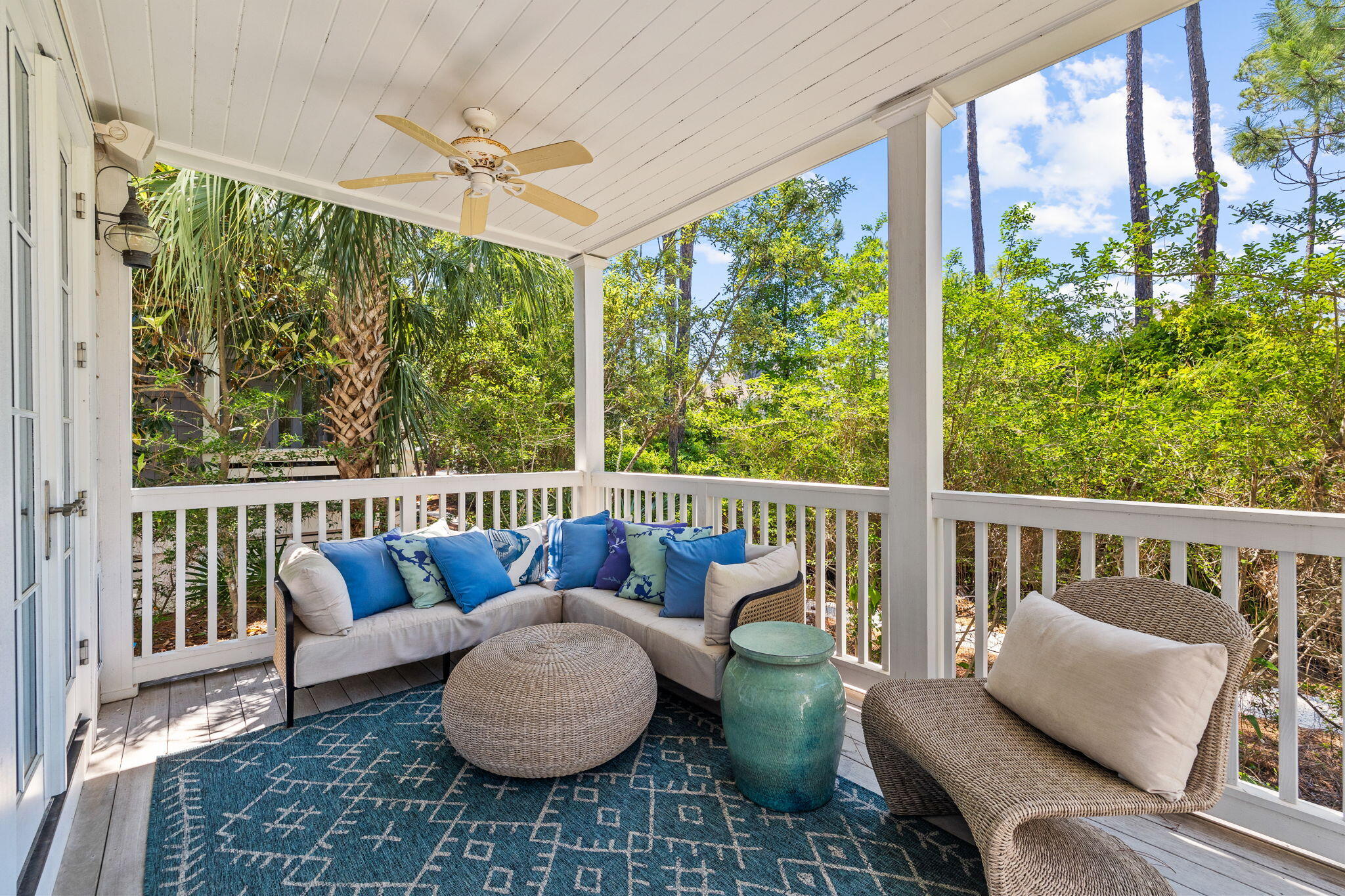 38 Shingle Lane Inlet Beach, FL 32461 - Photo 62 of 94 a balcony with furniture and a potted plant