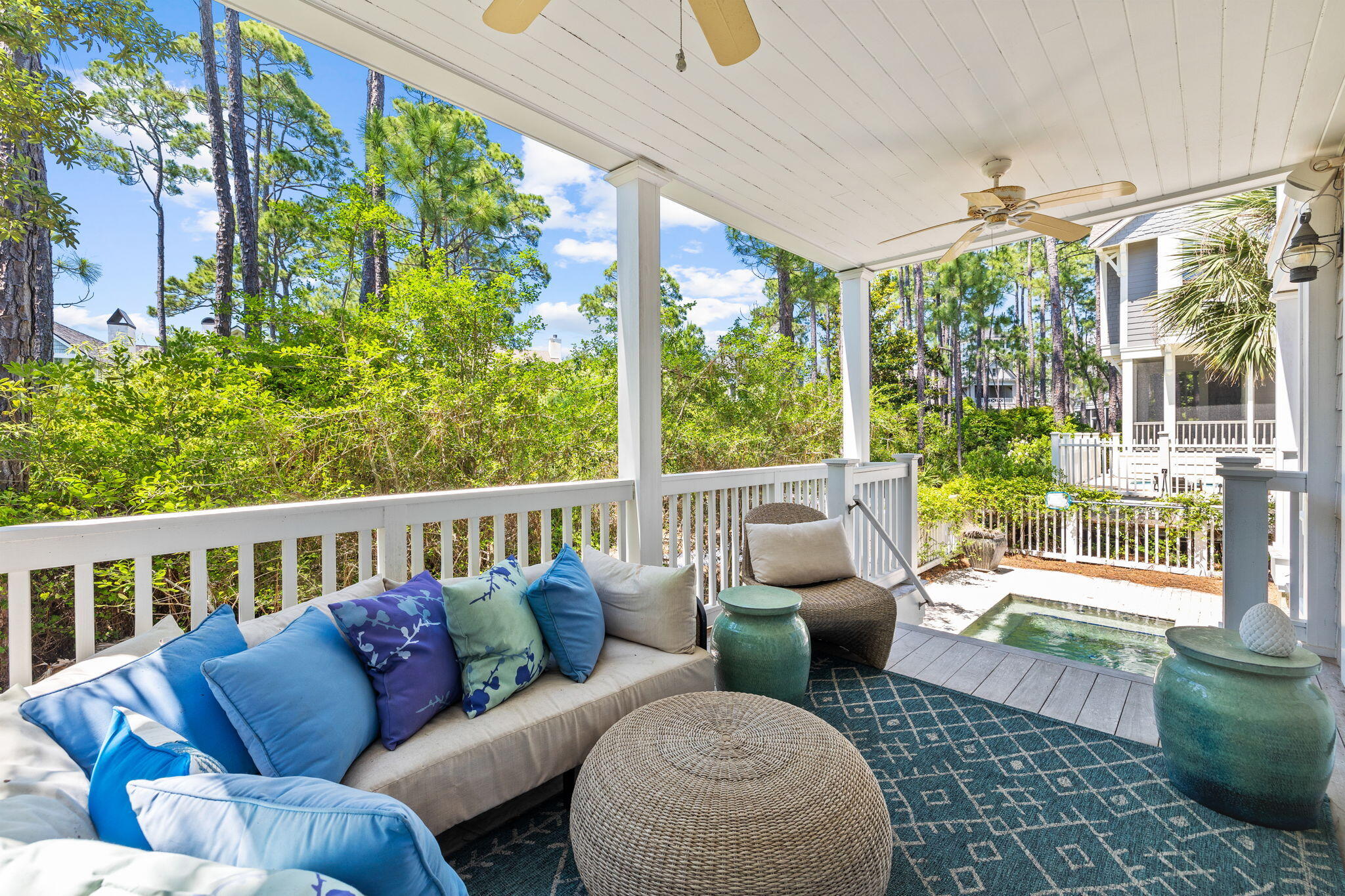 38 Shingle Lane Inlet Beach, FL 32461 - Photo 63 of 94 a balcony with furniture and a potted plant