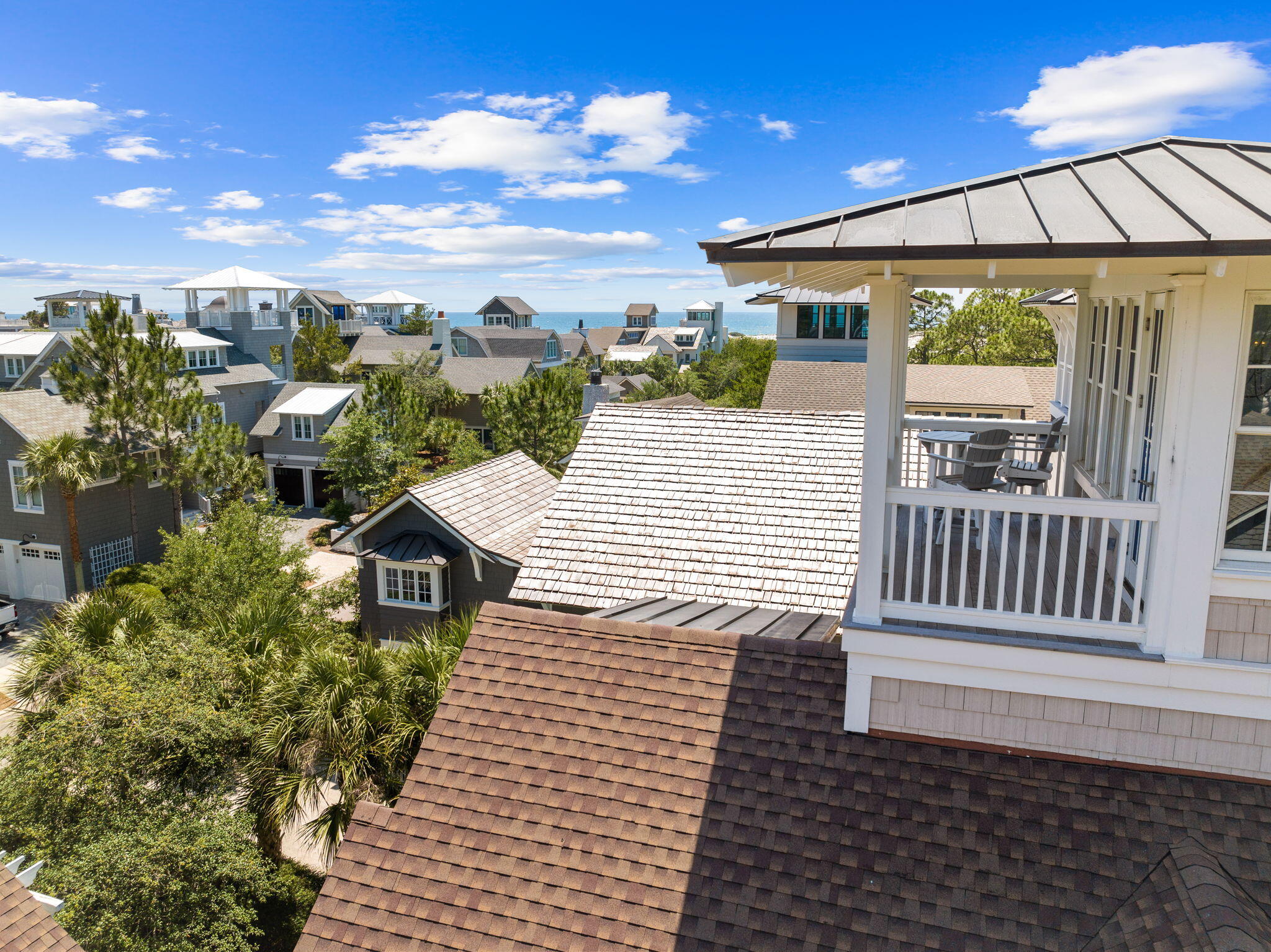 38 Shingle Lane Inlet Beach, FL 32461 - Photo 82 of 94 a view of a patio with a table and chairs