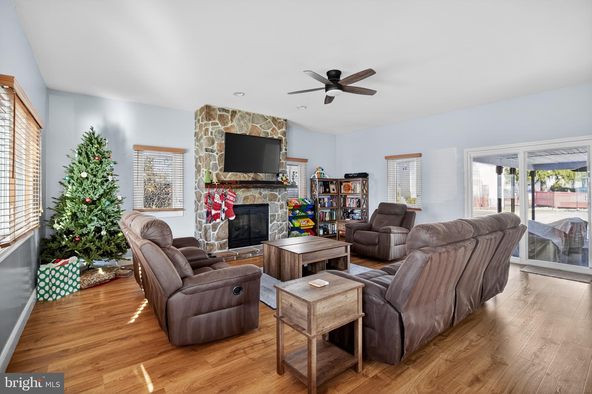 236 Hickory Road Warminster, PA 18974 - Photo 17 of 36 a living room with furniture a flat screen tv and a fireplace
