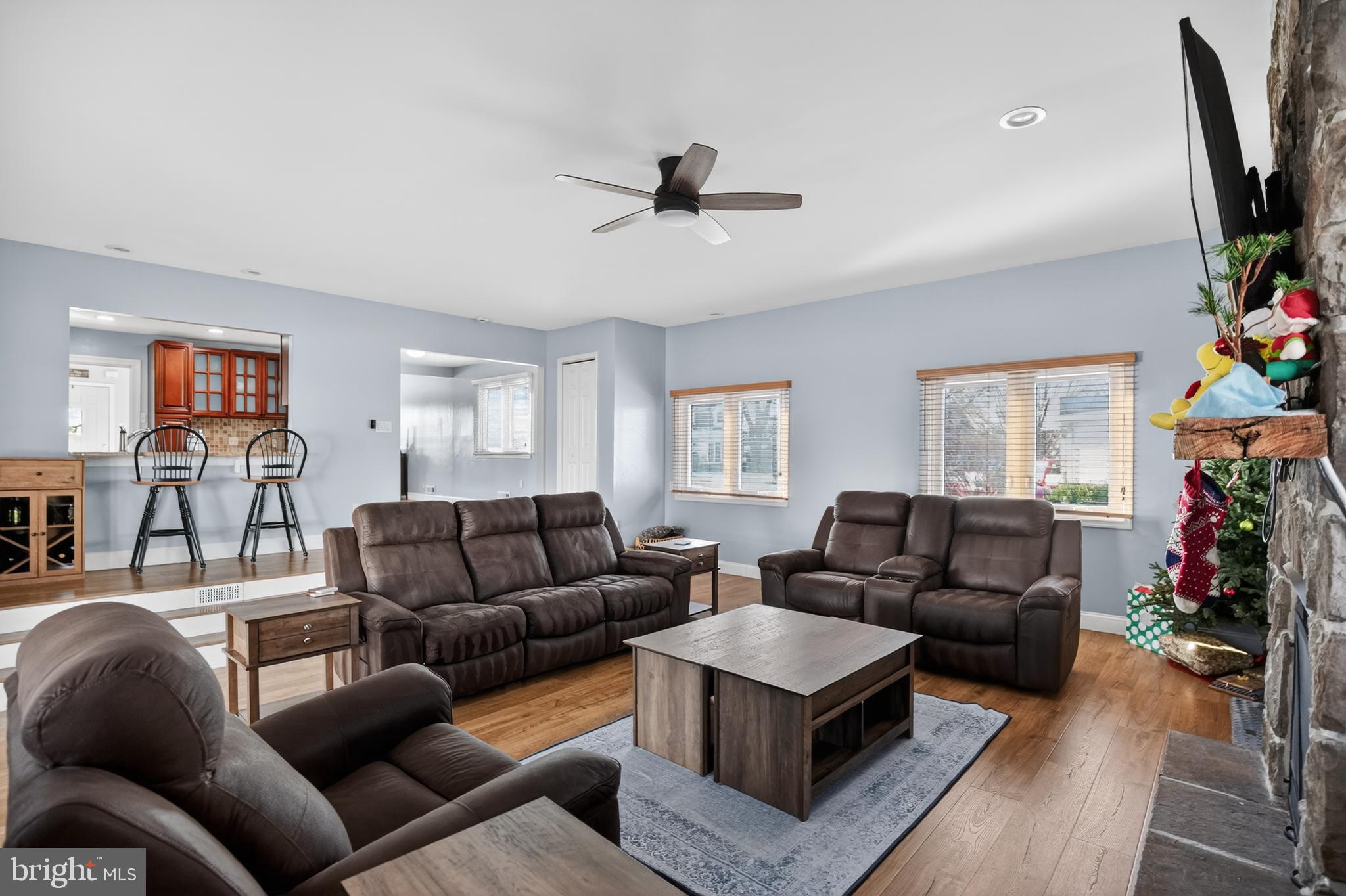 236 Hickory Road Warminster, PA 18974 - Photo 18 of 36 a living room with furniture a flat screen tv and a window