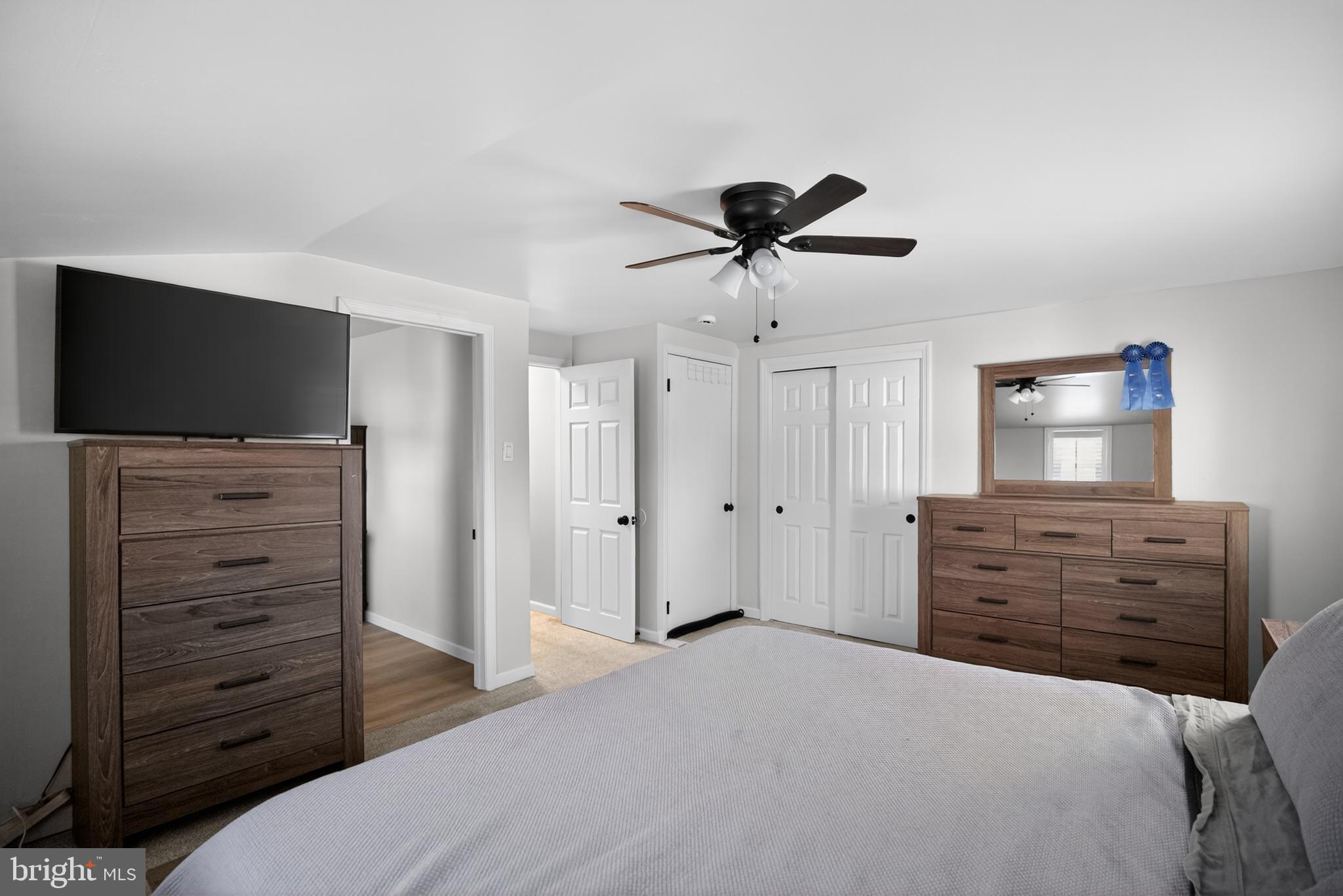236 Hickory Road Warminster, PA 18974 - Photo 22 of 36 a bedroom with a bed and a flat screen tv