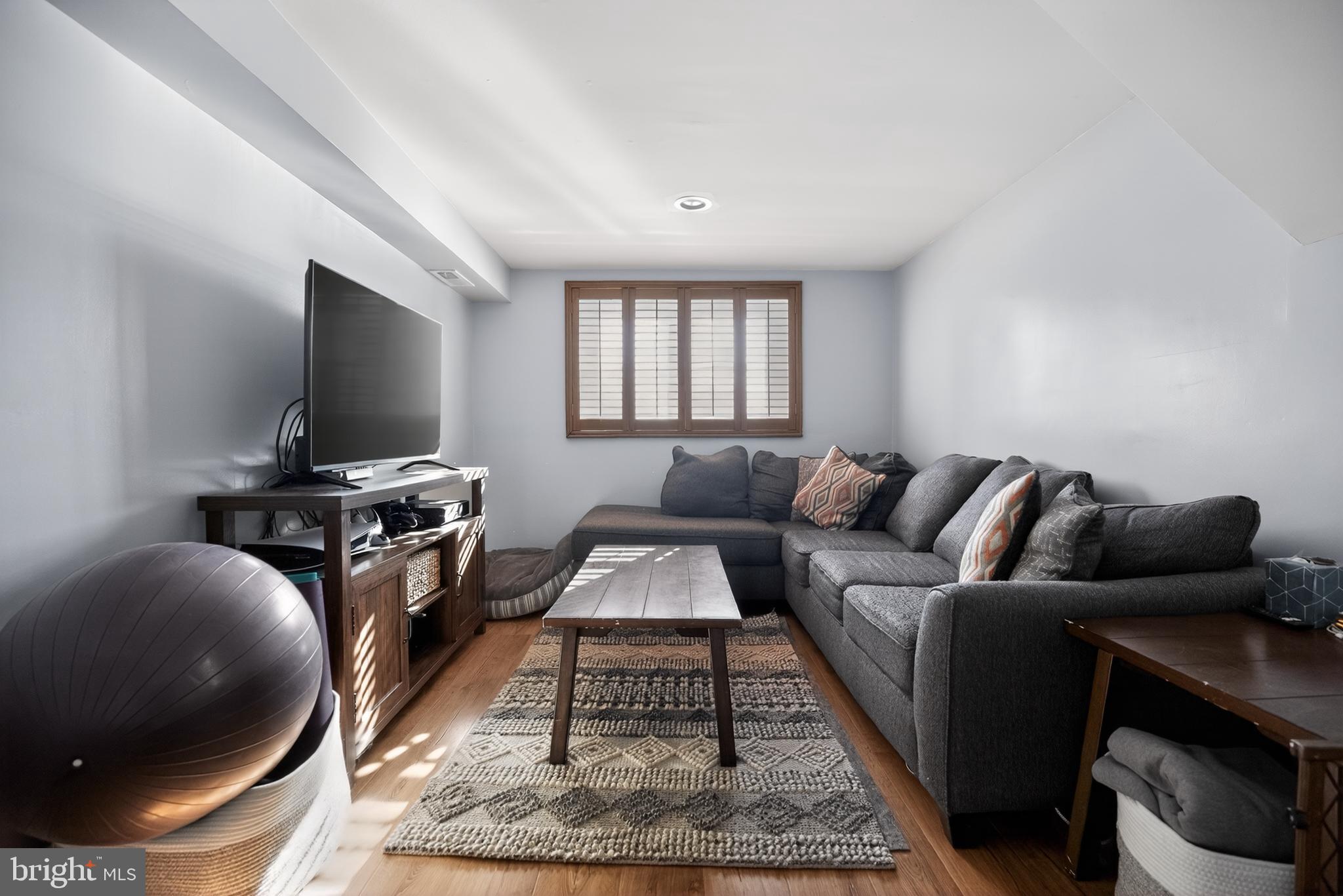 236 Hickory Road Warminster, PA 18974 - Photo 29 of 36 a living room with furniture and a flat screen tv