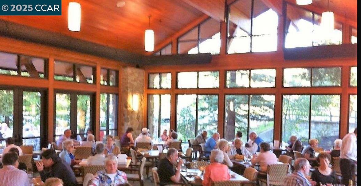 1832 Golden Rain Road, Unit 6 Walnut Creek, CA 94595 - Photo 15 of 36 a large room with lots of people in it