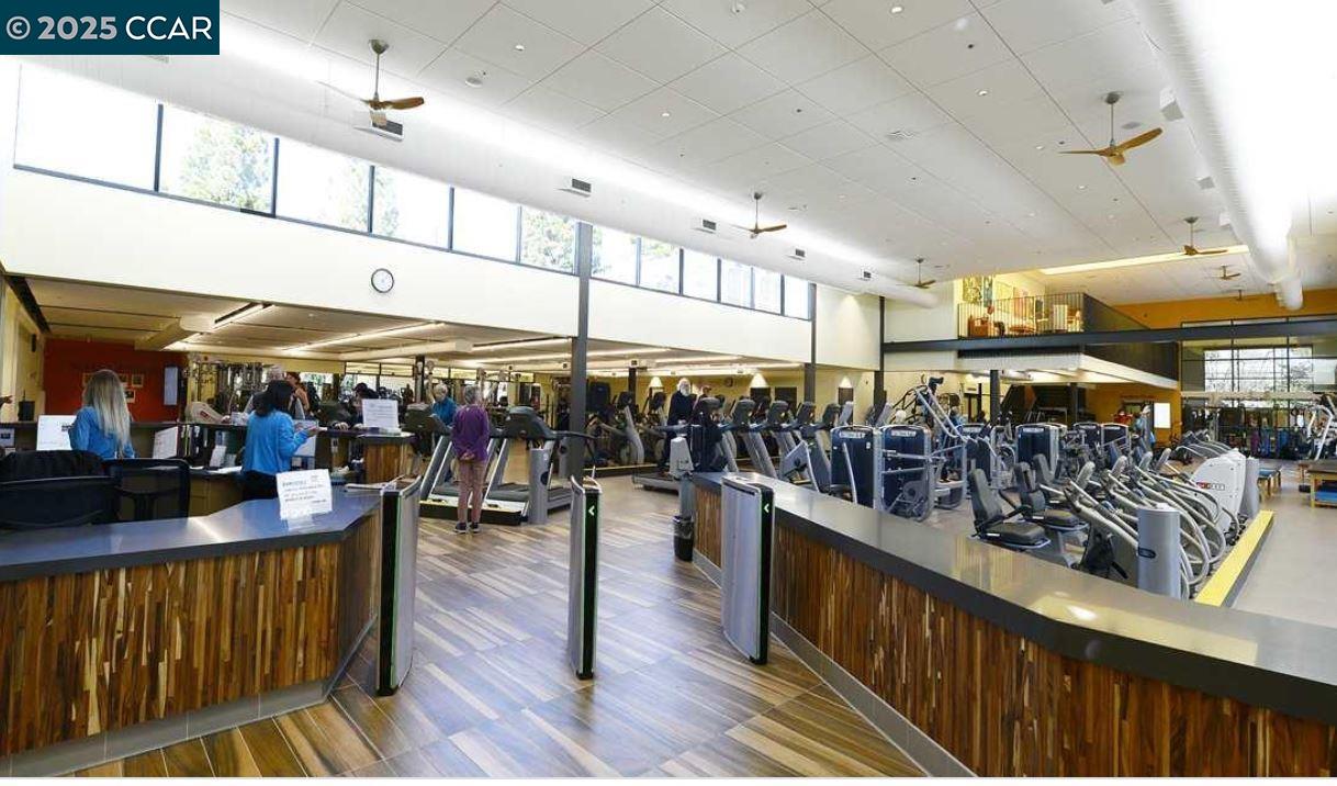 1832 Golden Rain Road, Unit 6 Walnut Creek, CA 94595 - Photo 32 of 36 a view of a swimming pool with outdoor seating