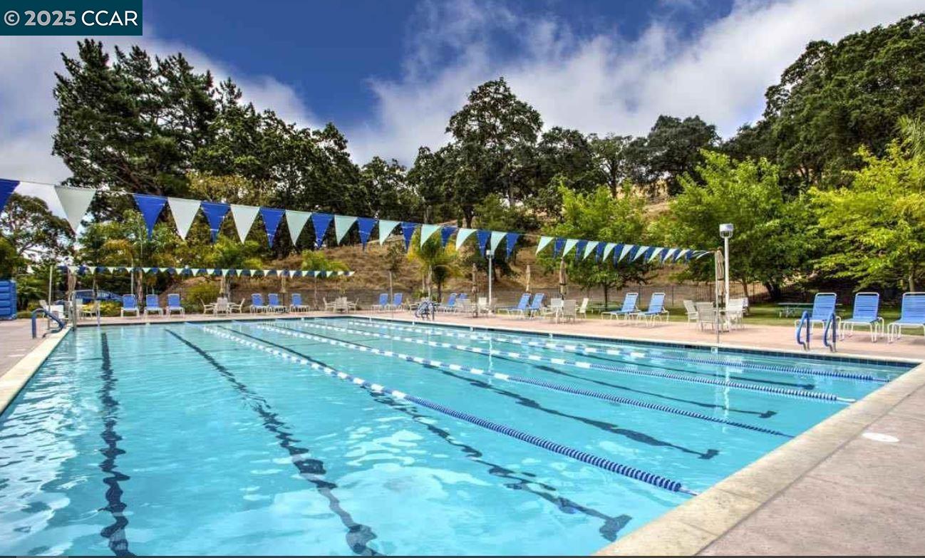 1832 Golden Rain Road, Unit 6 Walnut Creek, CA 94595 - Photo 35 of 36 a view of swimming pool with a patio