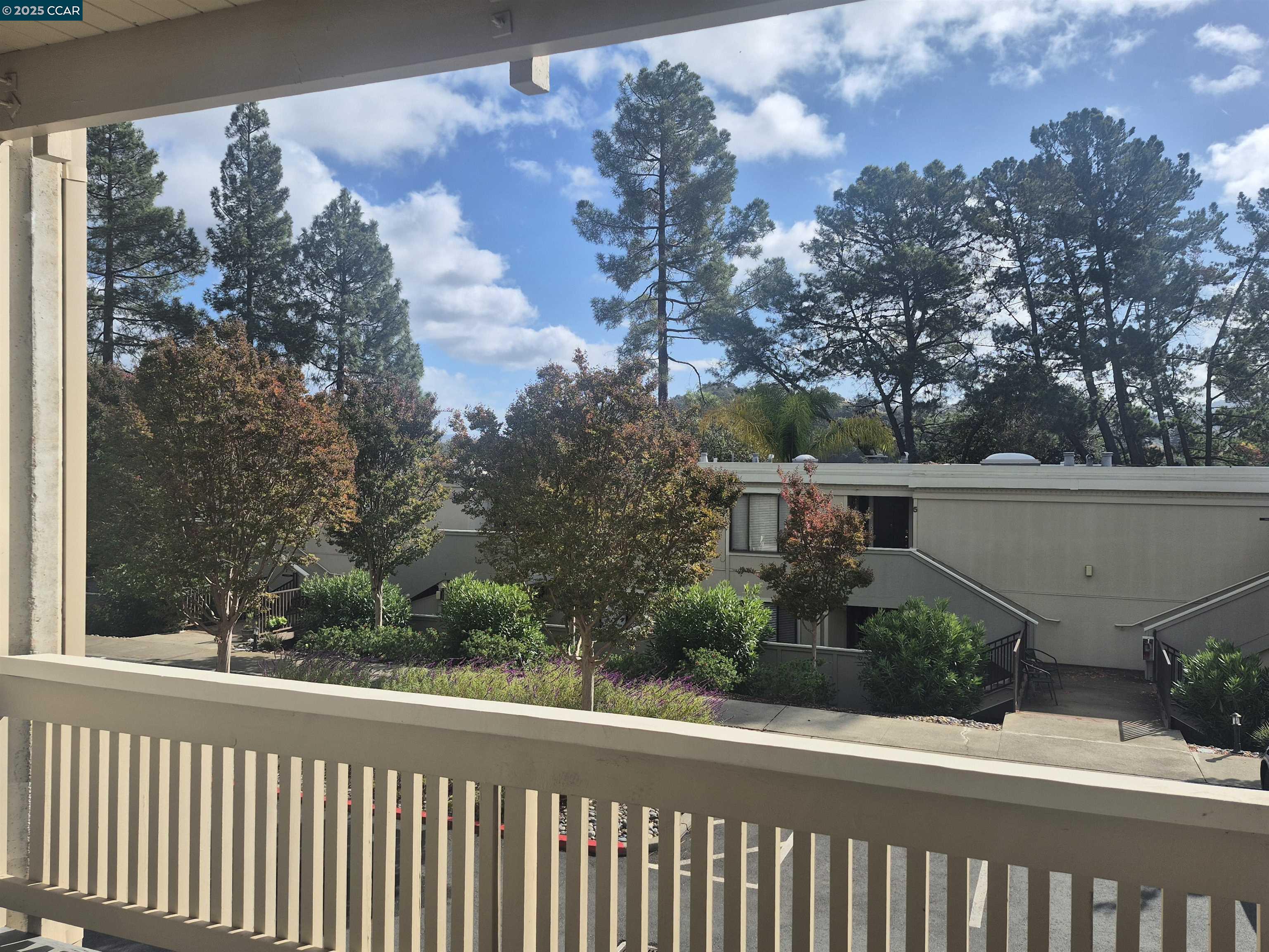 1832 Golden Rain Road, Unit 6 Walnut Creek, CA 94595 - Photo 8 of 36 a view of a street from a balcony