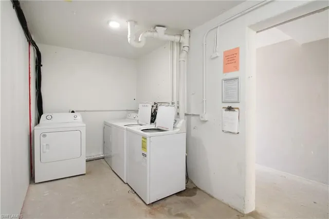 a view of storage room with washer and dryer