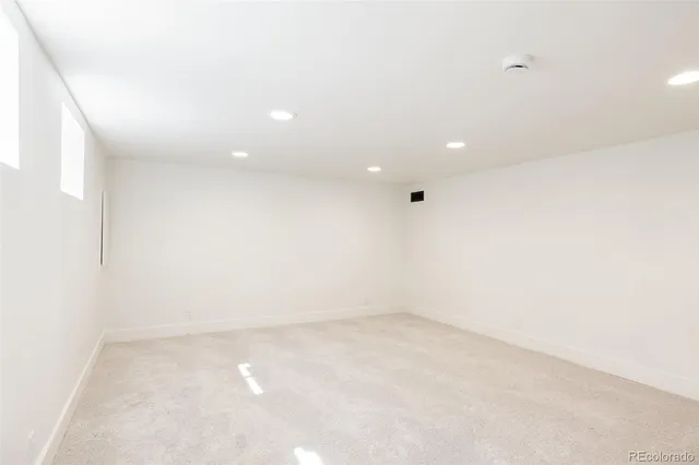an empty room with a natural light