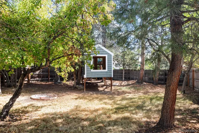 a backyard of a house with seating space