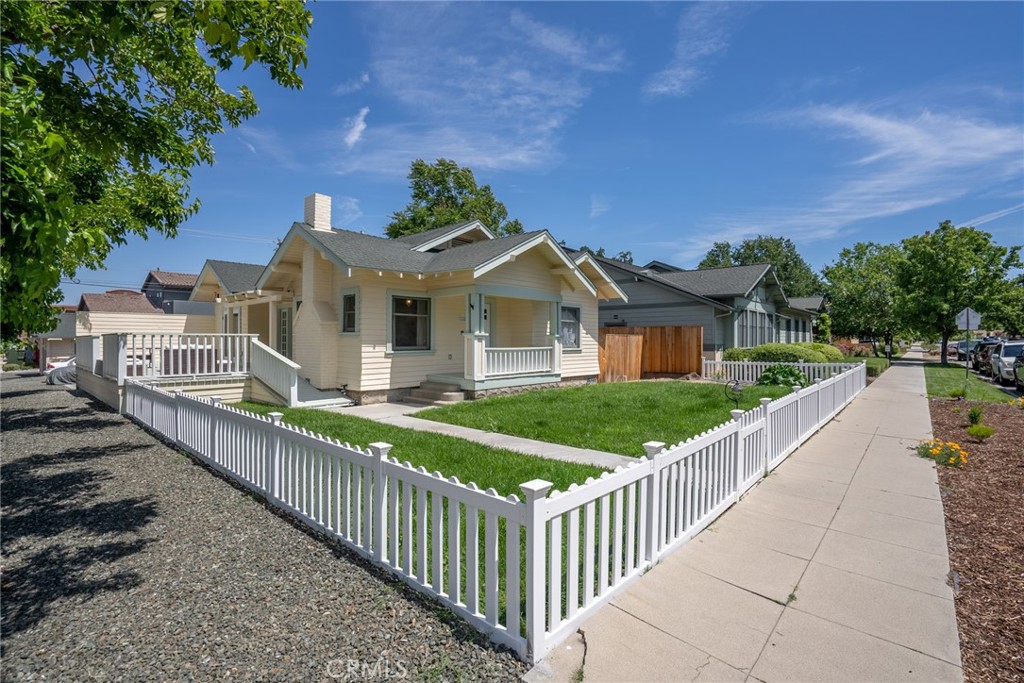 1444 Oak Street Paso Robles, CA 93446 - Photo 22 of 40 a view of a house with wooden fence next to a yard