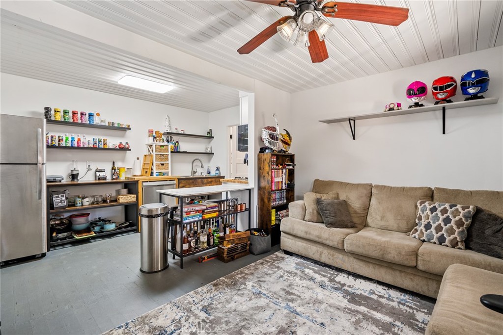 1444 Oak Street Paso Robles, CA 93446 - Photo 26 of 40 a living room with furniture and a couch