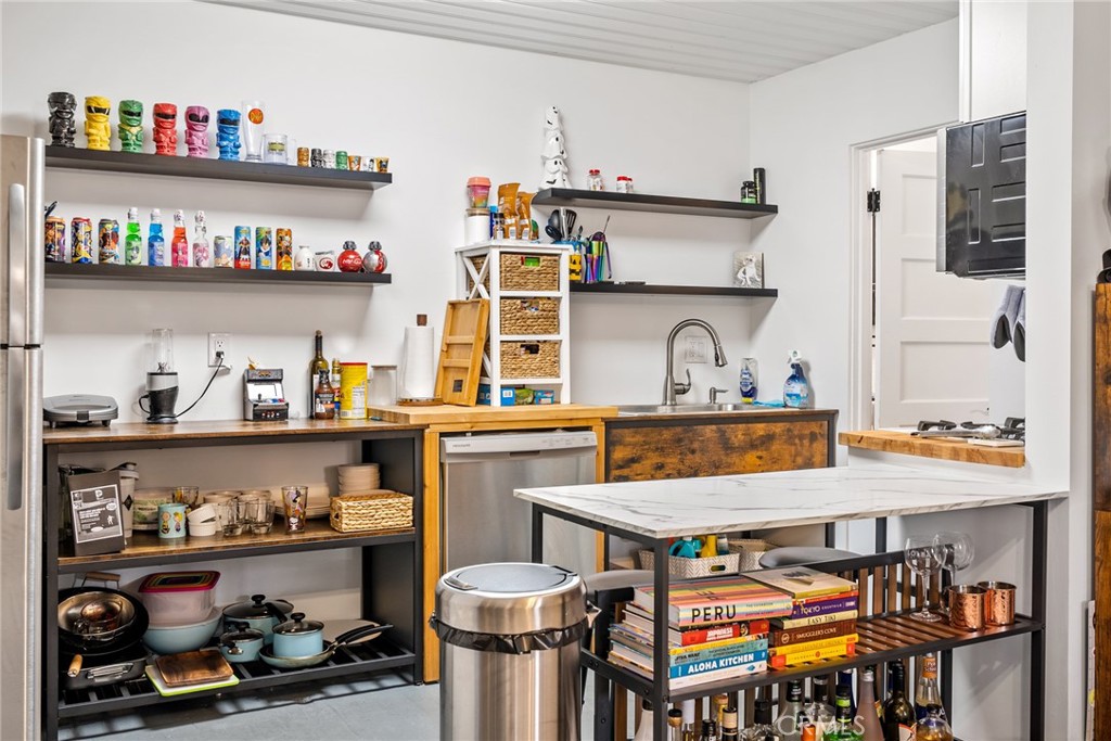 1444 Oak Street Paso Robles, CA 93446 - Photo 29 of 40 a outdoor space with lots of fruit on the table and chairs