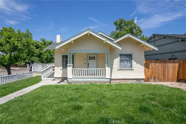 a view of a porch with a small yard