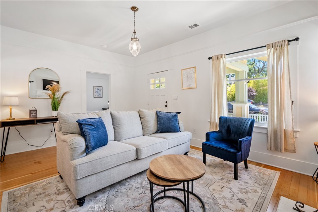 1444 Oak Street Paso Robles, CA 93446 - Photo 7 of 40 a living room with furniture and a window