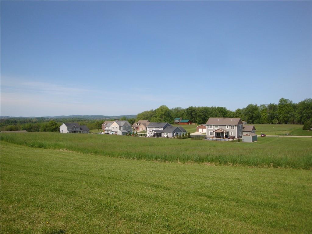 768 Victoria Way Derry, PA 15627 - Photo 2 of 4 a view of a grassy field with trees