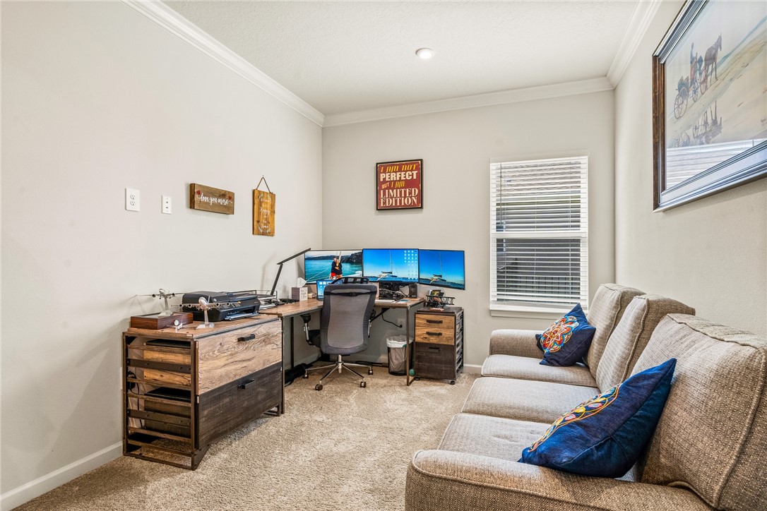 4202 Keeson Circle Vero Beach, FL 32967 - Photo 18 of 36 a living room with furniture and a window