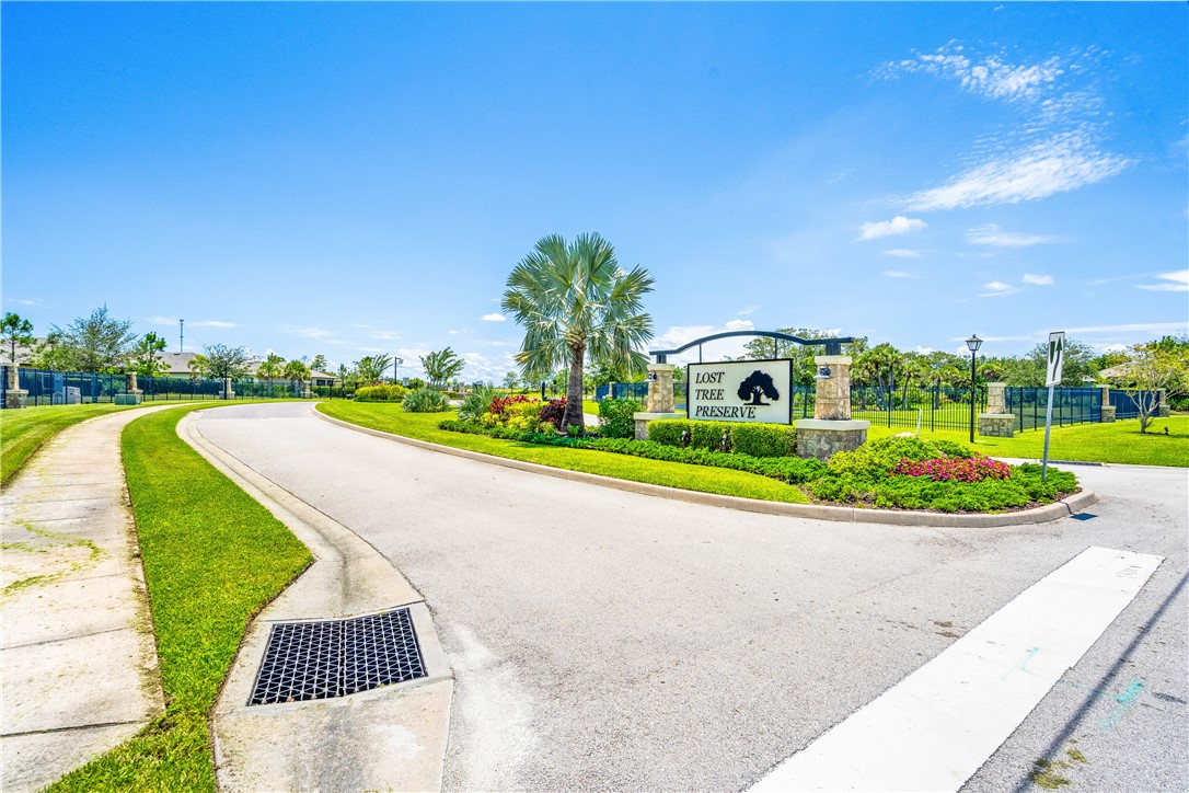 4202 Keeson Circle Vero Beach, FL 32967 - Photo 34 of 36 a view of a park with a house in the background
