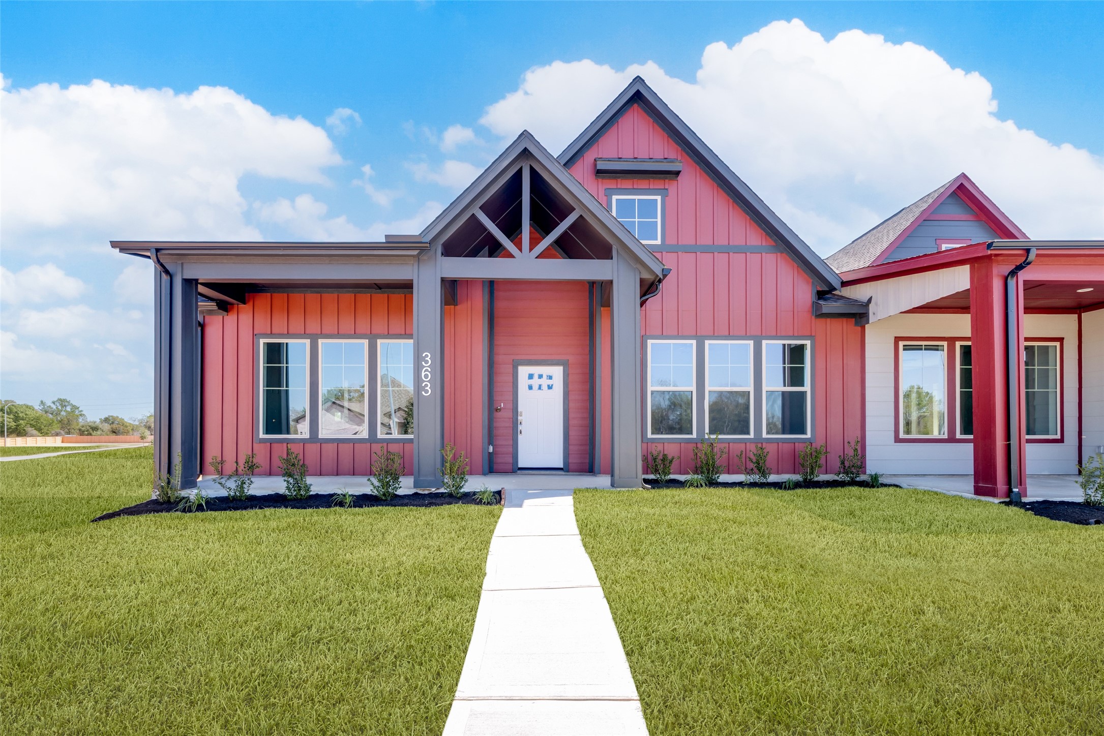 363 Legacy Point, Unit A Sealy, TX 77474 - Photo 1 of 26 a front view of house with yard and green space