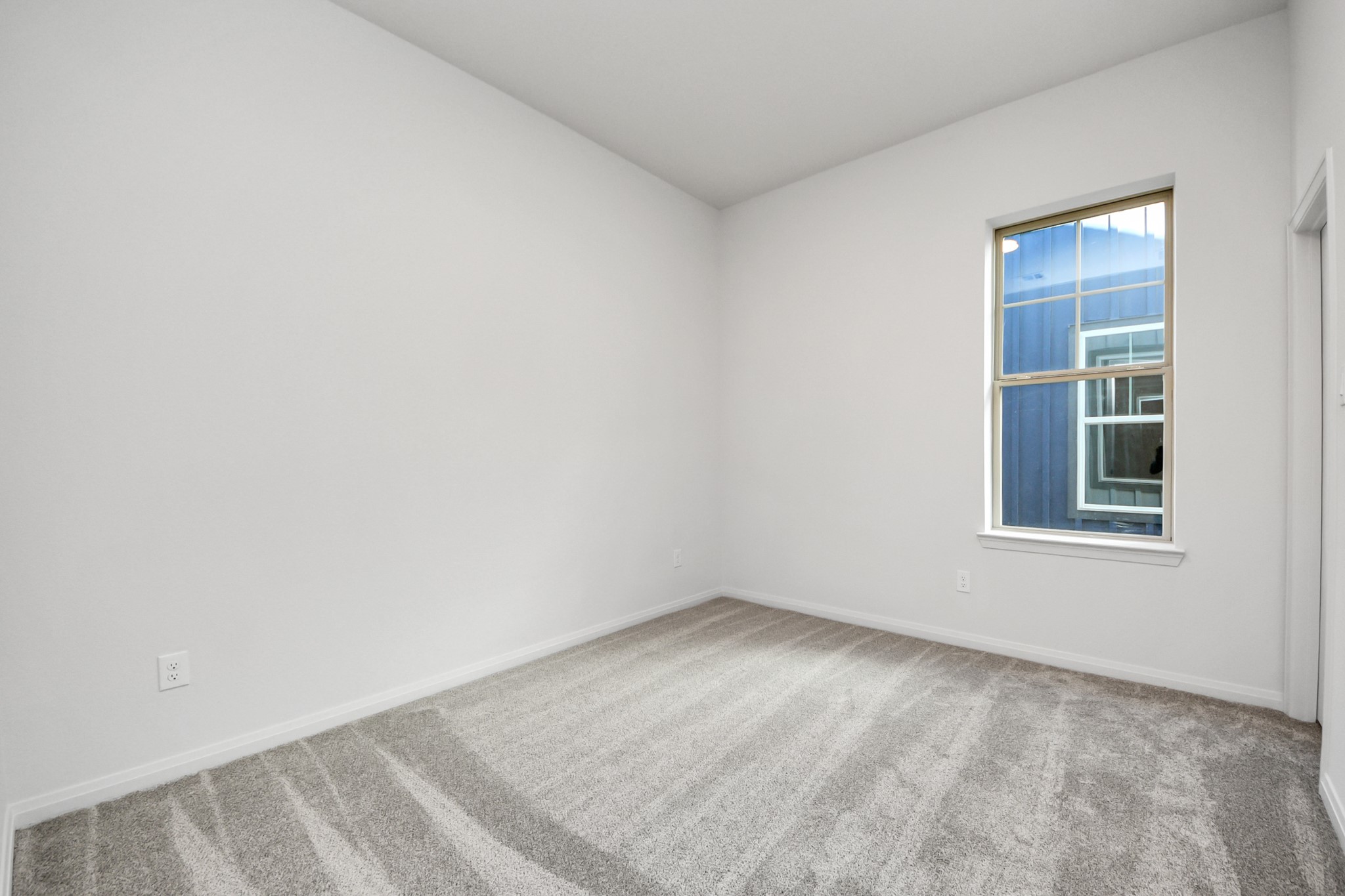 363 Legacy Point, Unit A Sealy, TX 77474 - Photo 21 of 26 an empty room with windows