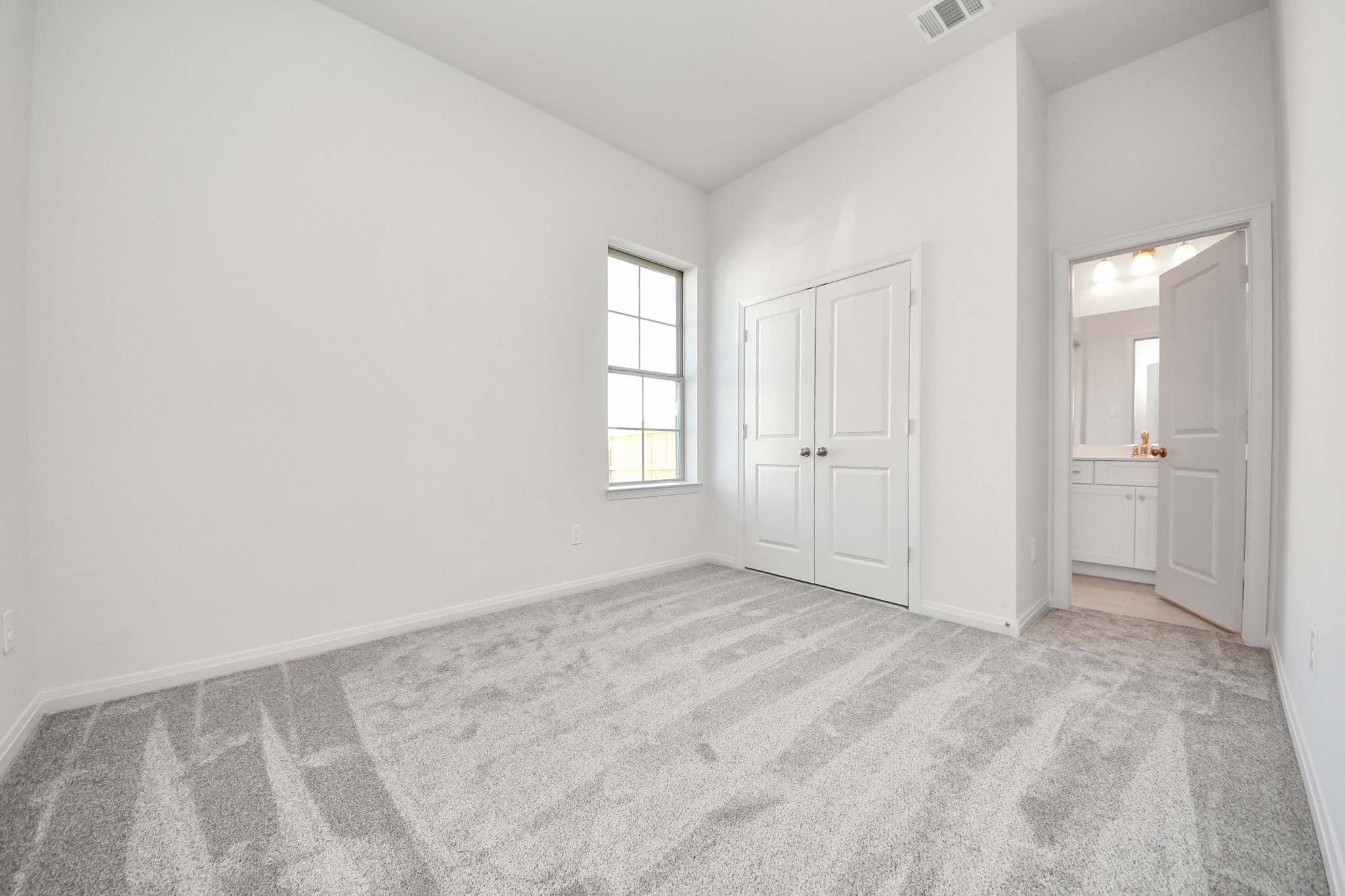 363 Legacy Point, Unit A Sealy, TX 77474 - Photo 23 of 26 an empty room with windows