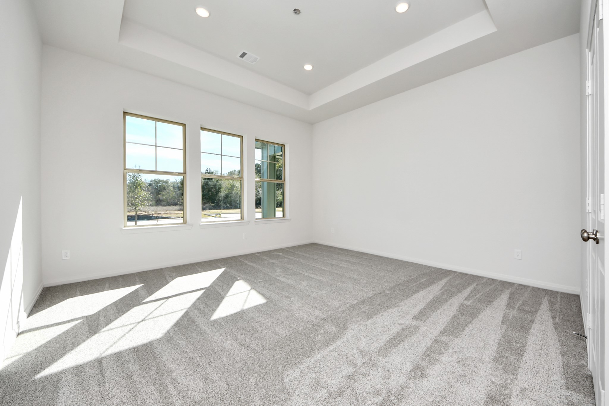363 Legacy Point, Unit A Sealy, TX 77474 - Photo 8 of 26 a view of an empty room with a window