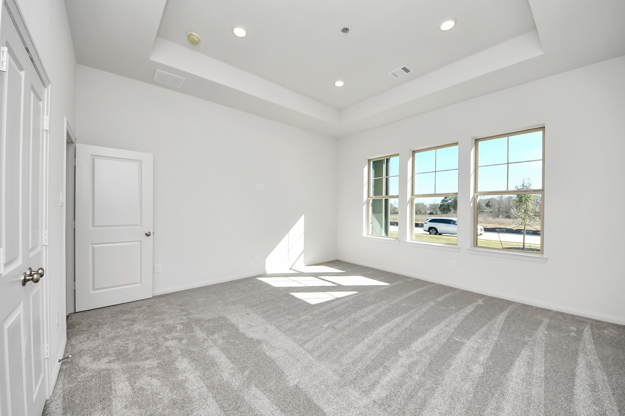 363 Legacy Point, Unit A Sealy, TX 77474 - Photo 10 of 26 a view of an empty room with a window