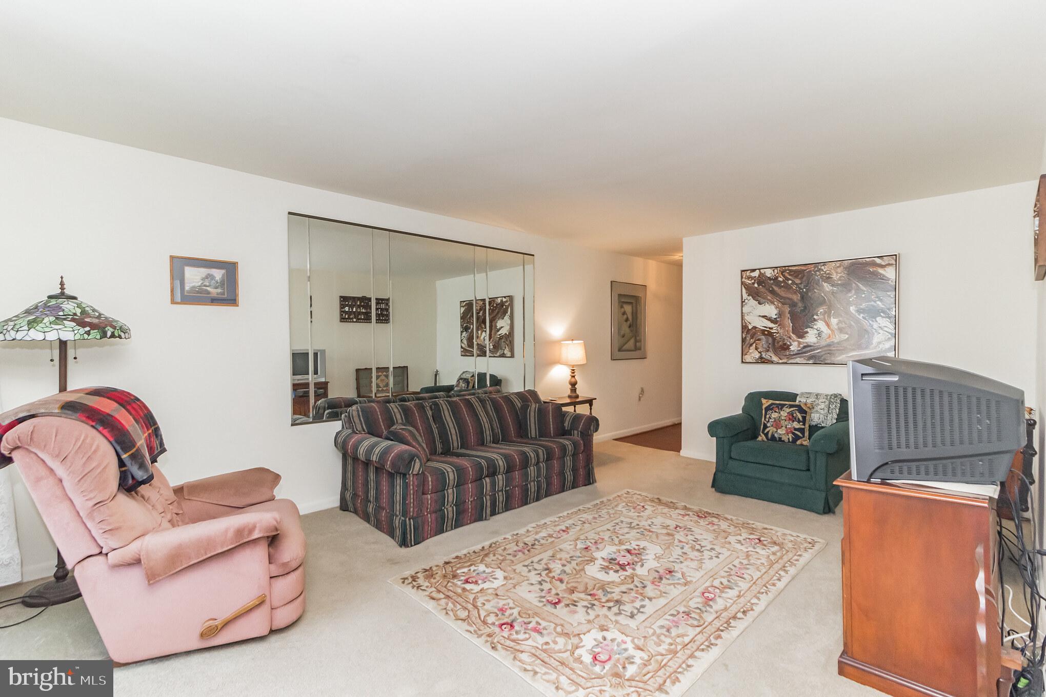 8679 Greenbelt Road, Unit 201 Greenbelt, MD 20770 - Photo 5 of 18 Living room (view 1)