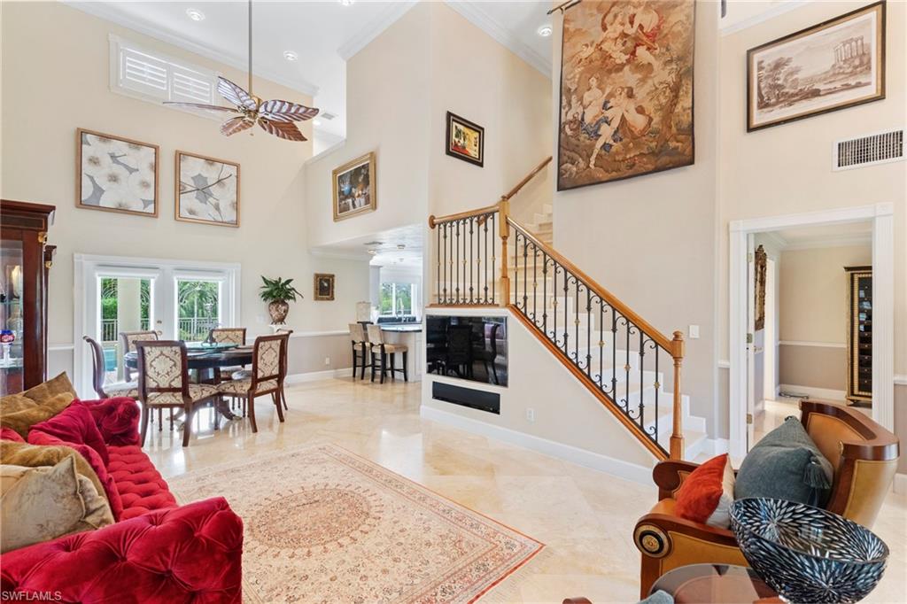 21571 North River Road Alva, FL 33920 - Photo 11 of 48 a living room with furniture or chandelier and a rug