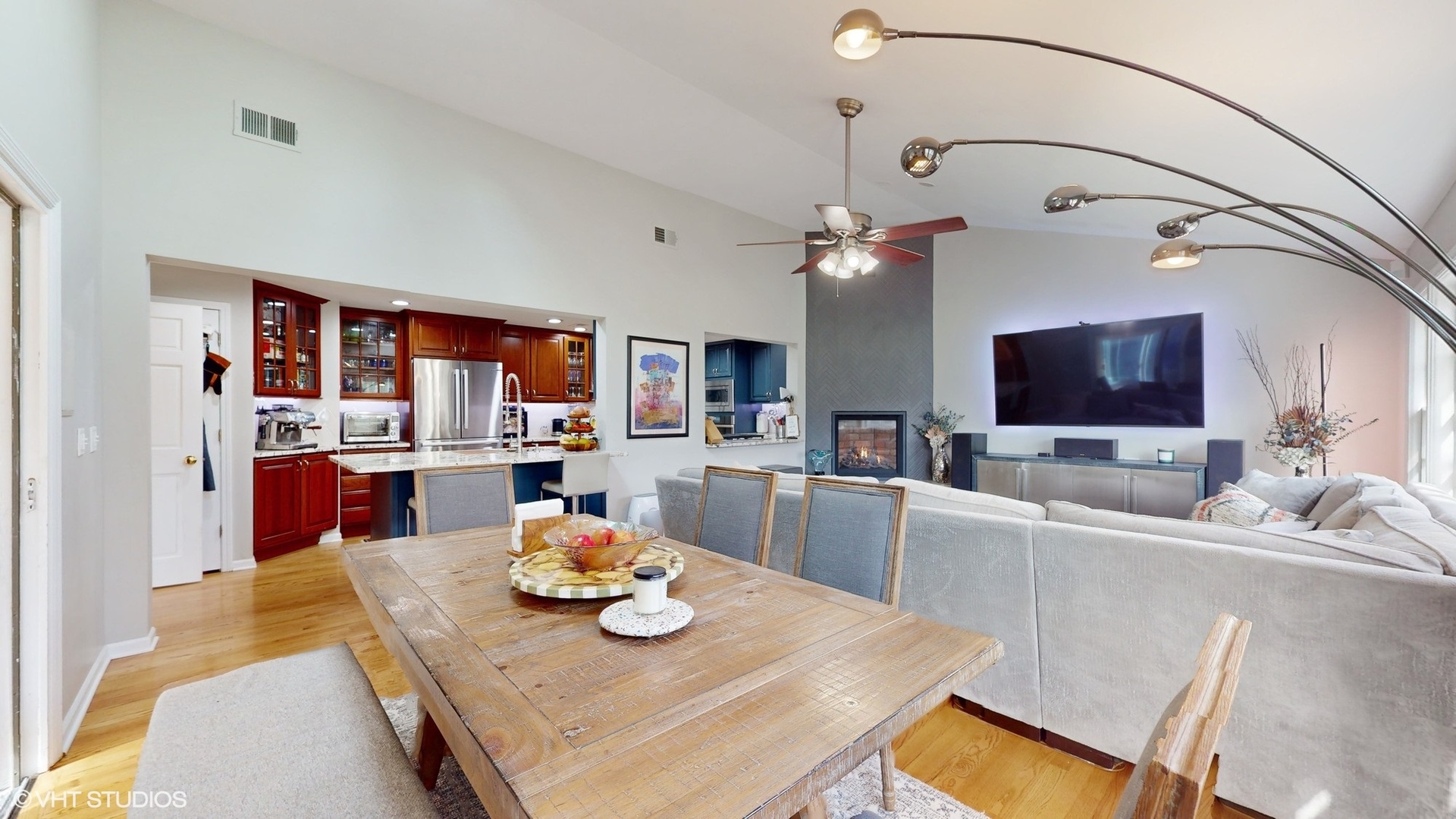 1925 Maple Place Riverwoods, IL 60015 - Photo 12 of 59 a view of a dining room with furniture and a flat screen tv