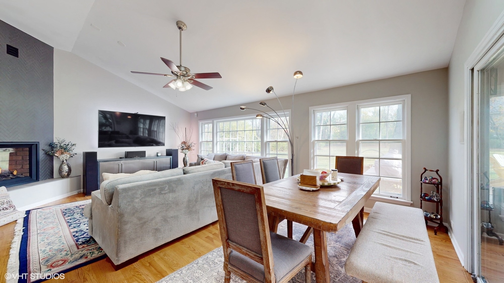 1925 Maple Place Riverwoods, IL 60015 - Photo 13 of 59 a living room with furniture a flat screen tv and a large window