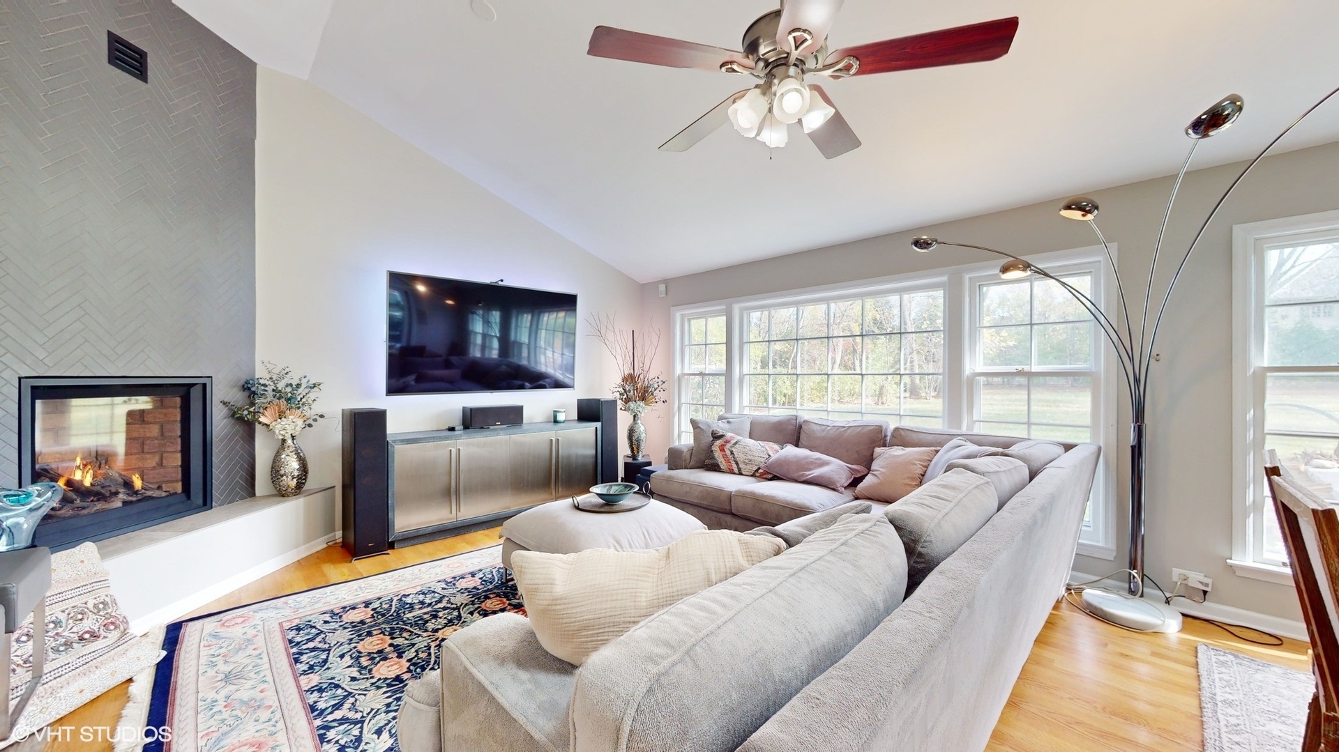 1925 Maple Place Riverwoods, IL 60015 - Photo 15 of 59 a living room with furniture and a flat screen tv