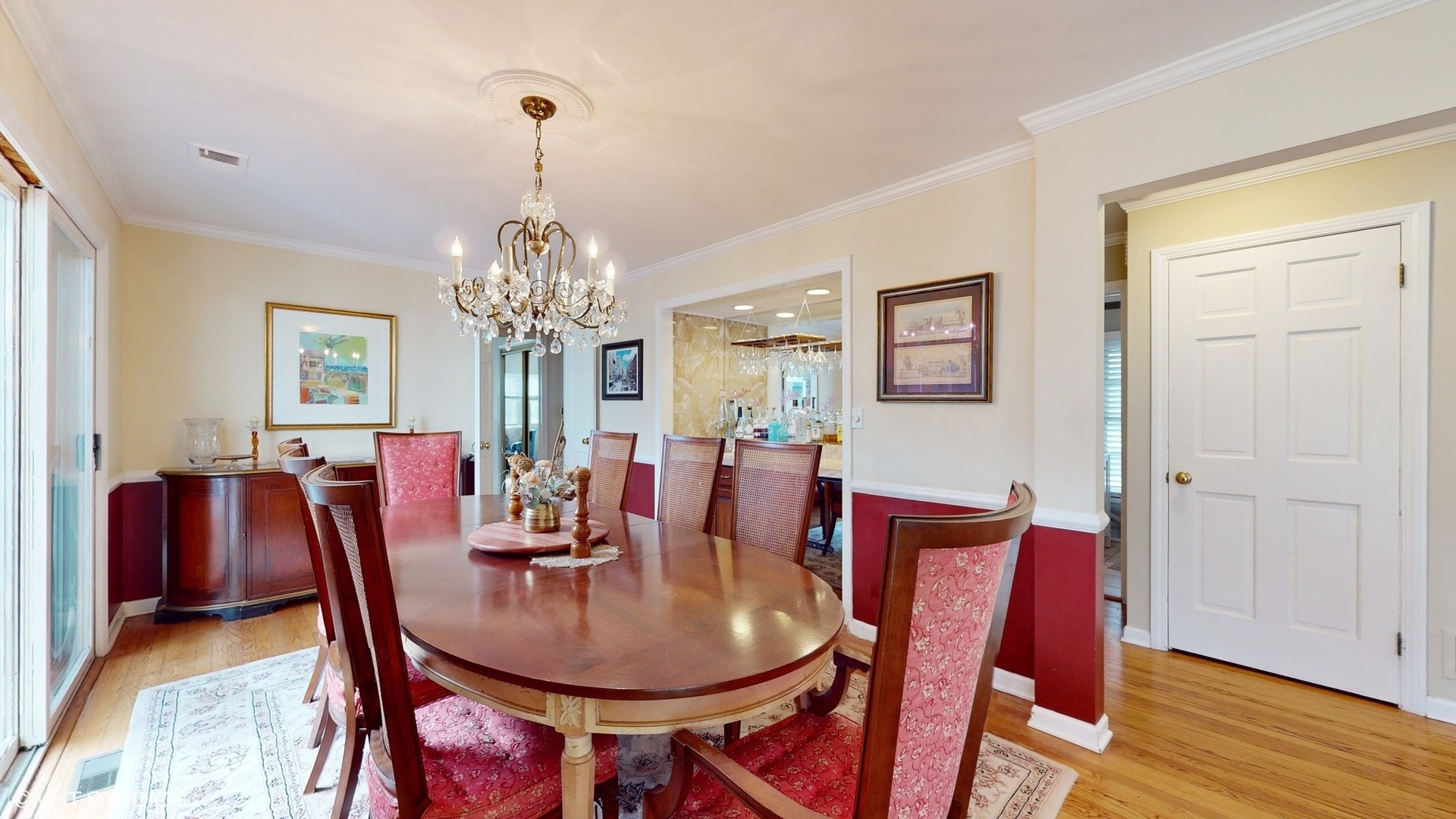 1925 Maple Place Riverwoods, IL 60015 - Photo 18 of 59 a view of a dining room with furniture and wooden floor