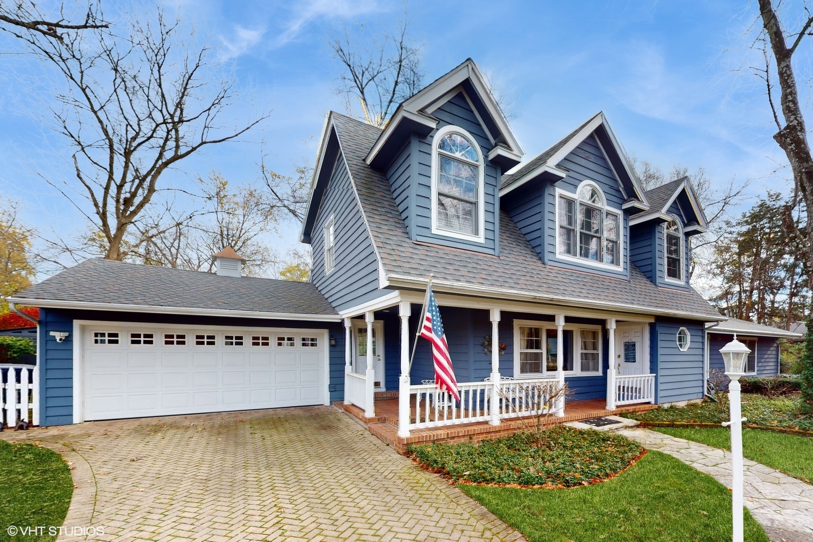 1925 Maple Place Riverwoods, IL 60015 - Photo 2 of 59 a front view of a house with a yard