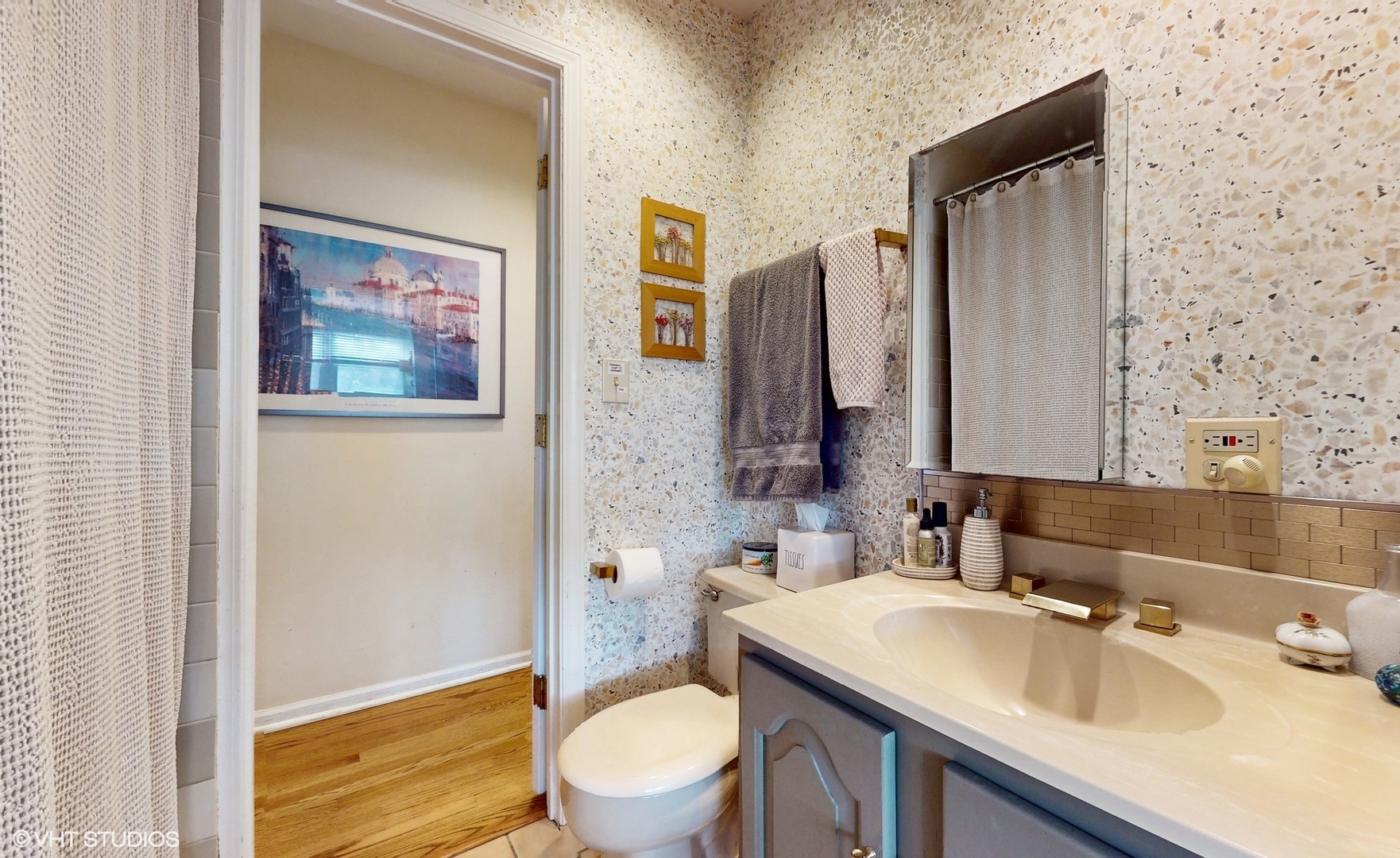 1925 Maple Place Riverwoods, IL 60015 - Photo 26 of 59 a bathroom with a toilet sink and mirror