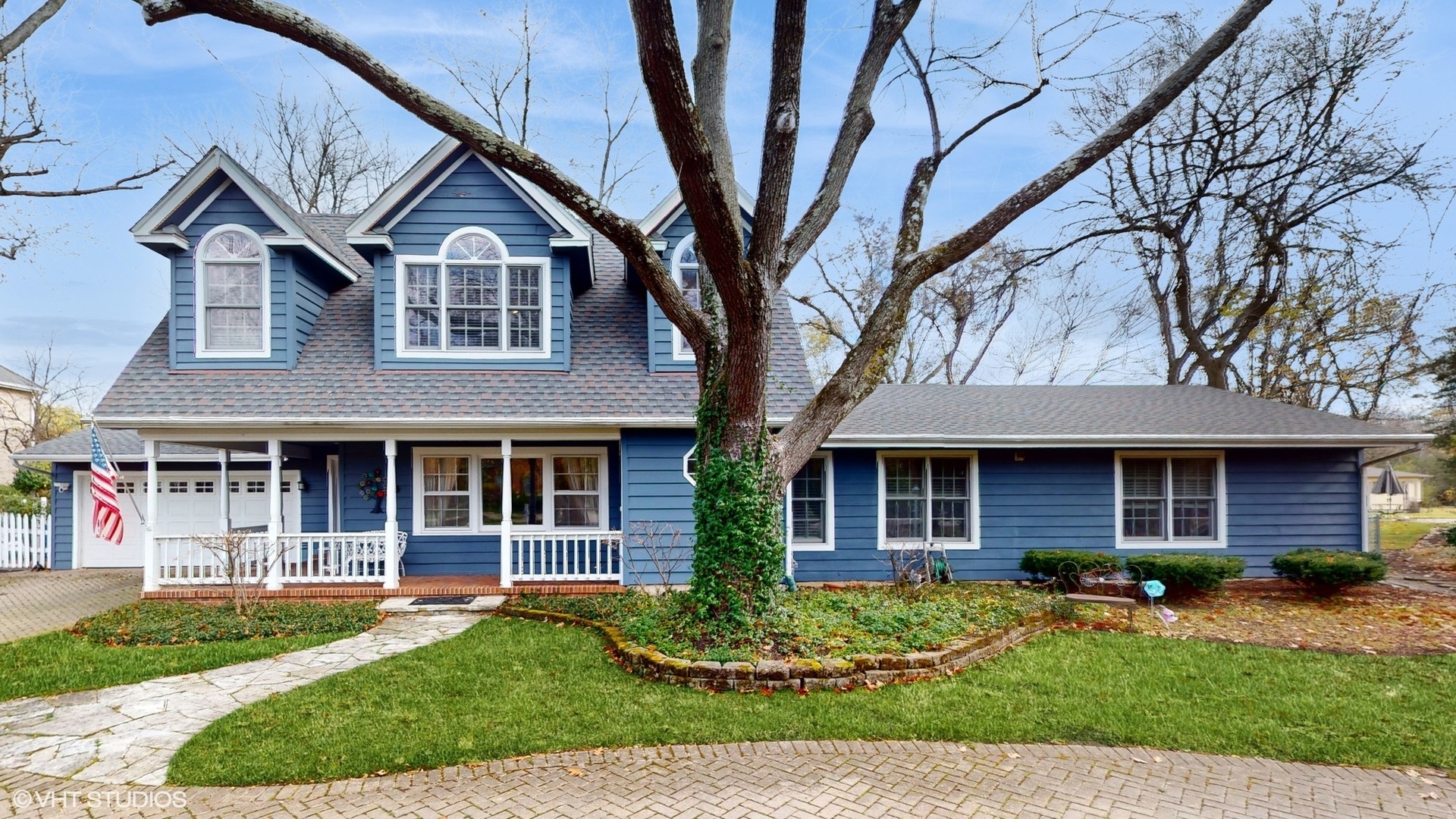 1925 Maple Place Riverwoods, IL 60015 - Photo 3 of 59 a front view of a house with a yard