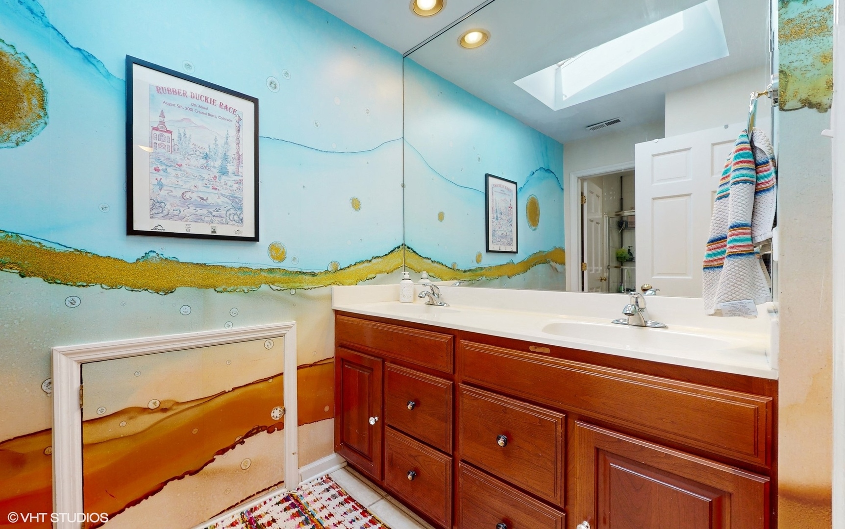 1925 Maple Place Riverwoods, IL 60015 - Photo 40 of 59 a bathroom with a sink double vanity and a mirror