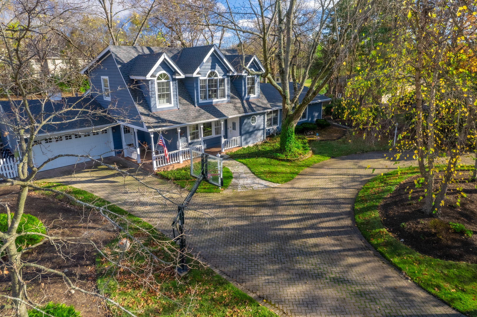 1925 Maple Place Riverwoods, IL 60015 - Photo 50 of 59 a front view of a house with a yard