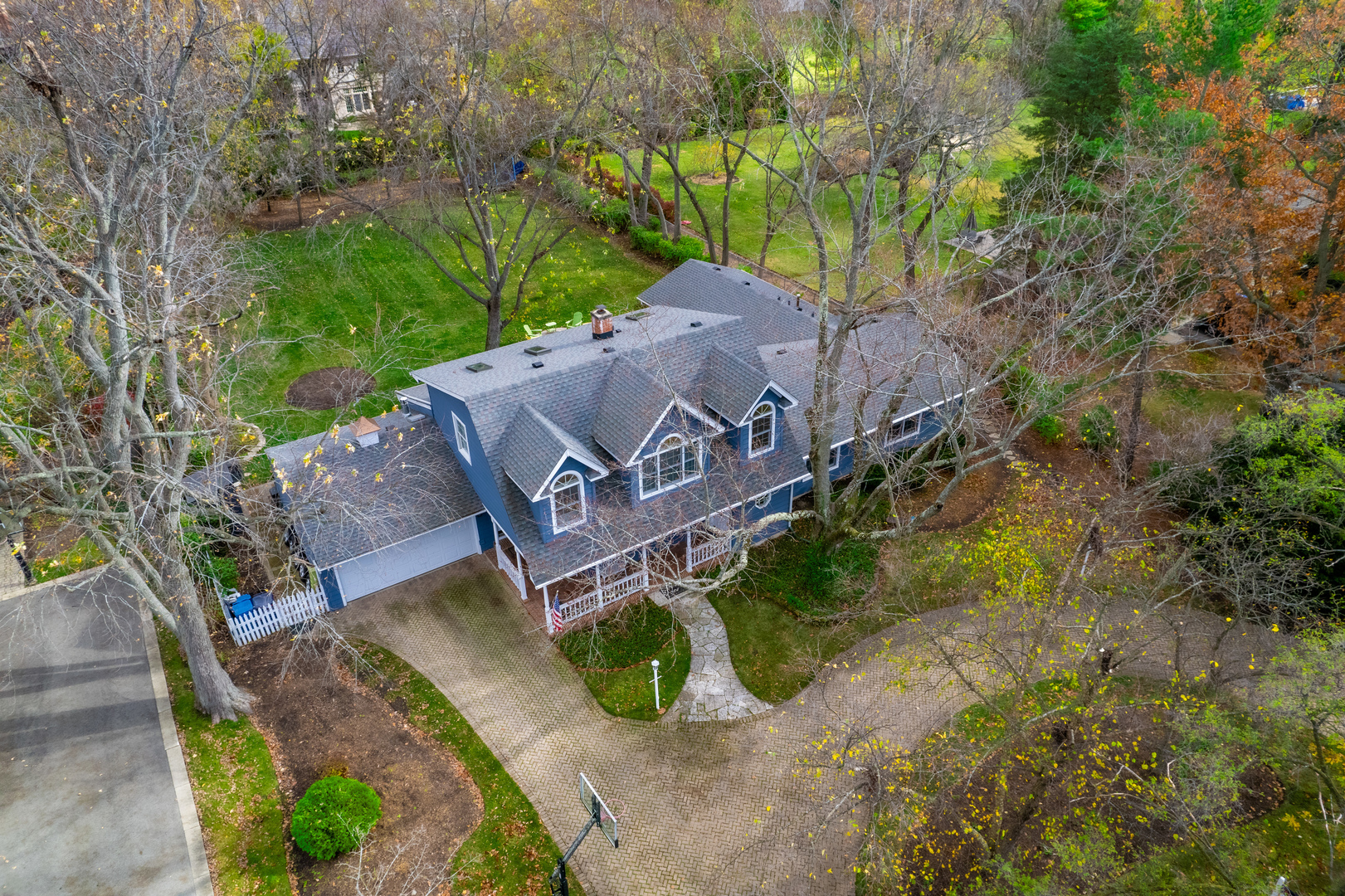 1925 Maple Place Riverwoods, IL 60015 - Photo 53 of 59 an aerial view of a house with a yard