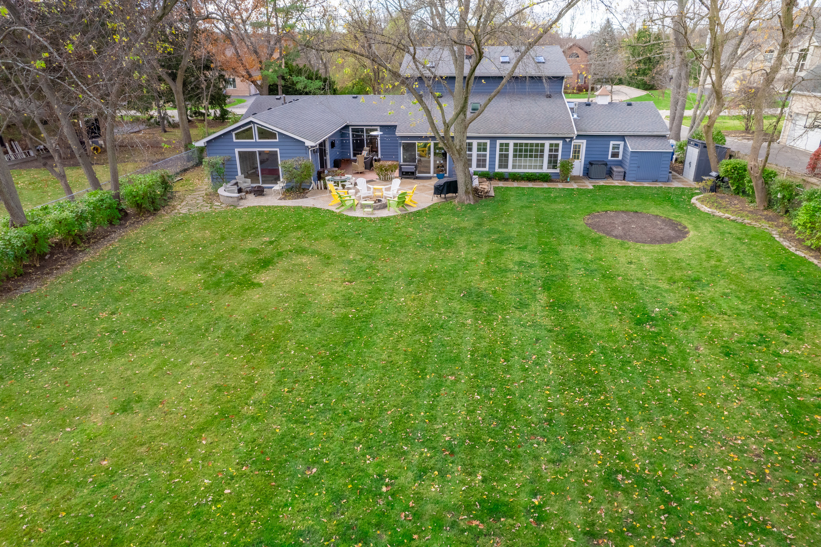 1925 Maple Place Riverwoods, IL 60015 - Photo 55 of 59 a front view of a house with garden