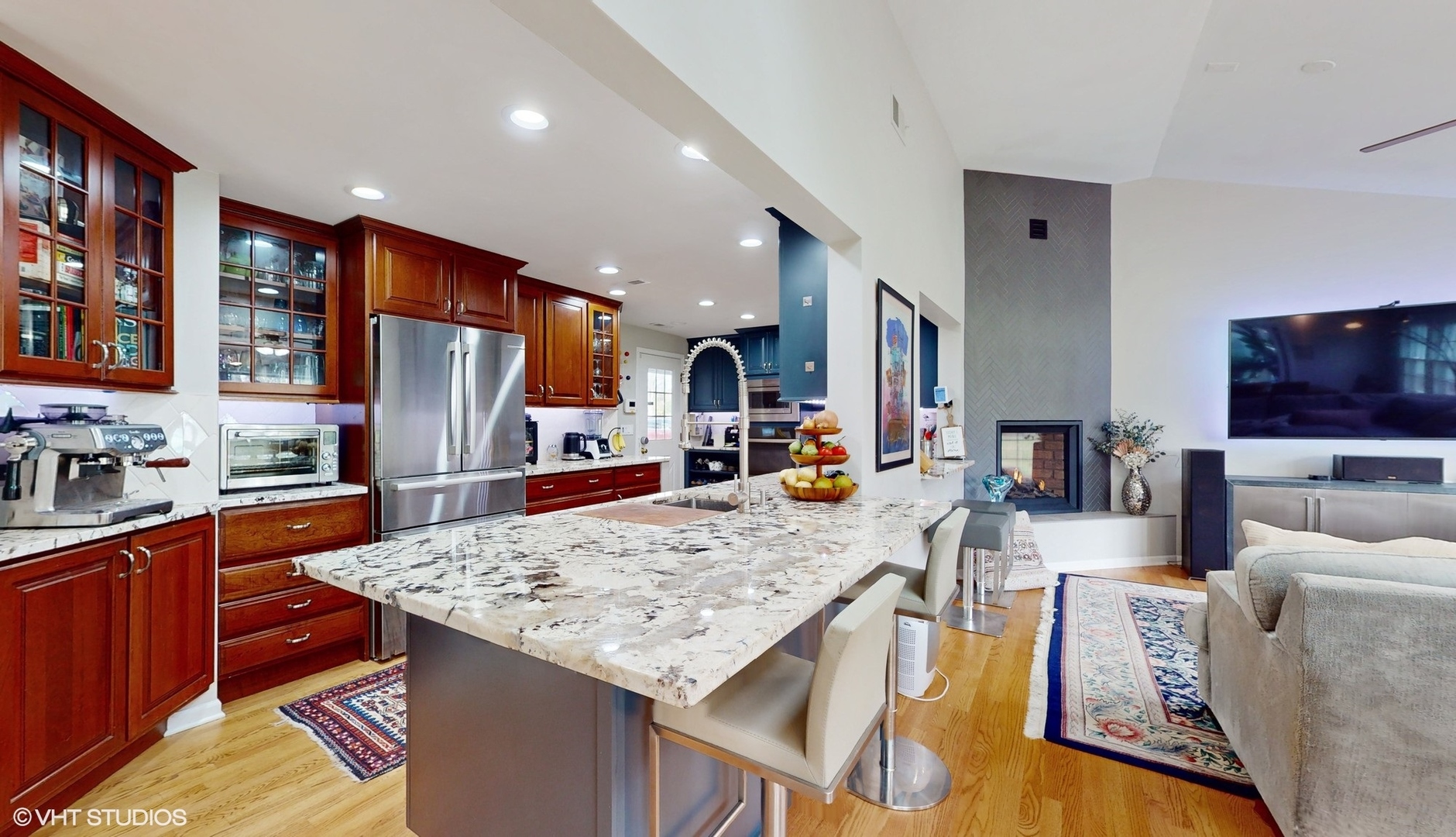 1925 Maple Place Riverwoods, IL 60015 - Photo 8 of 59 a kitchen with stainless steel appliances granite countertop a kitchen island sink refrigerator and cabinets